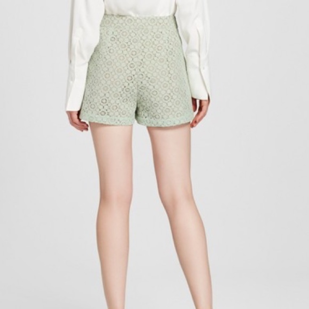Victoria Beckham Lace Overlay Pleated Shorts - Picture 2 of 7